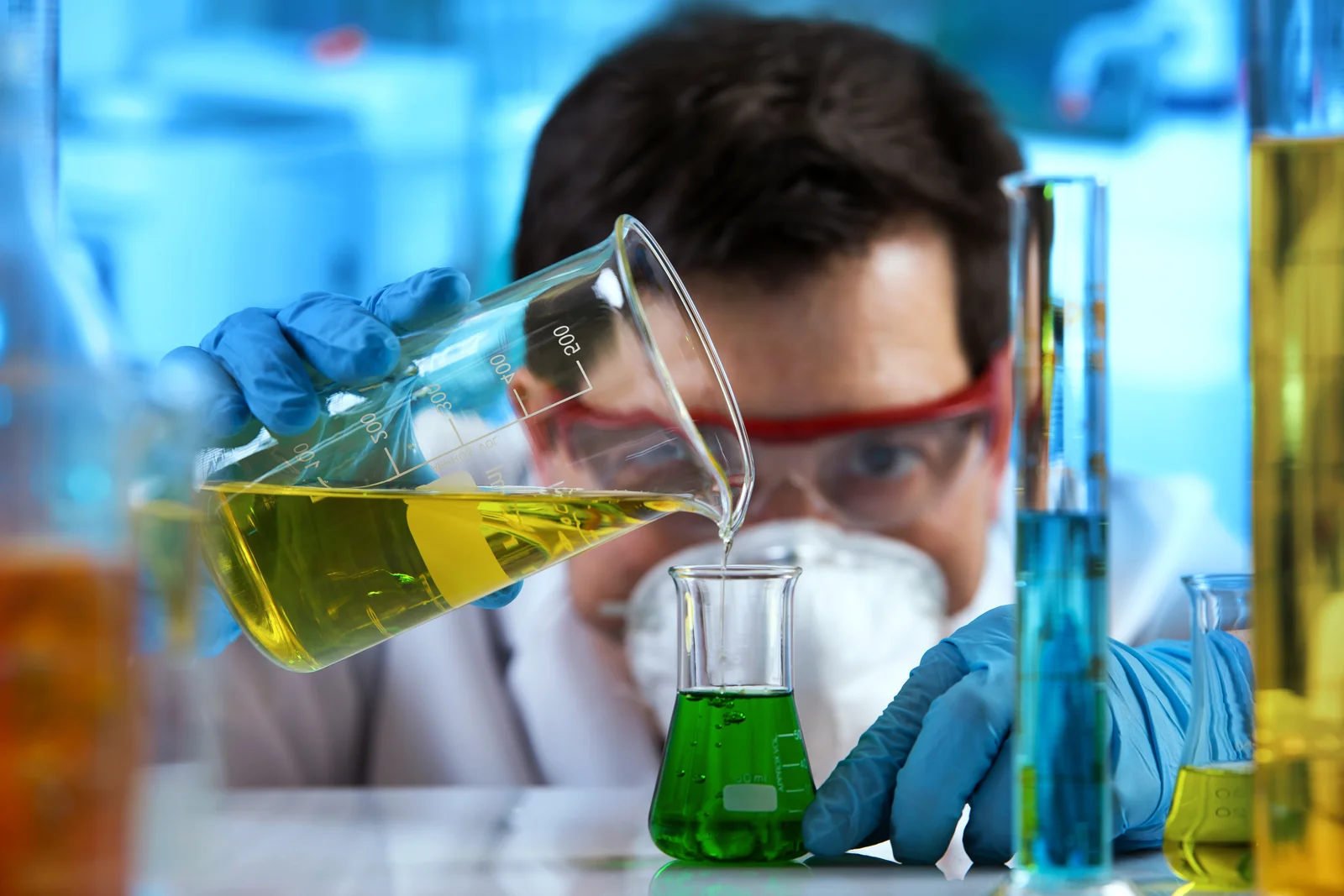 Technician handling a sealed sample vial